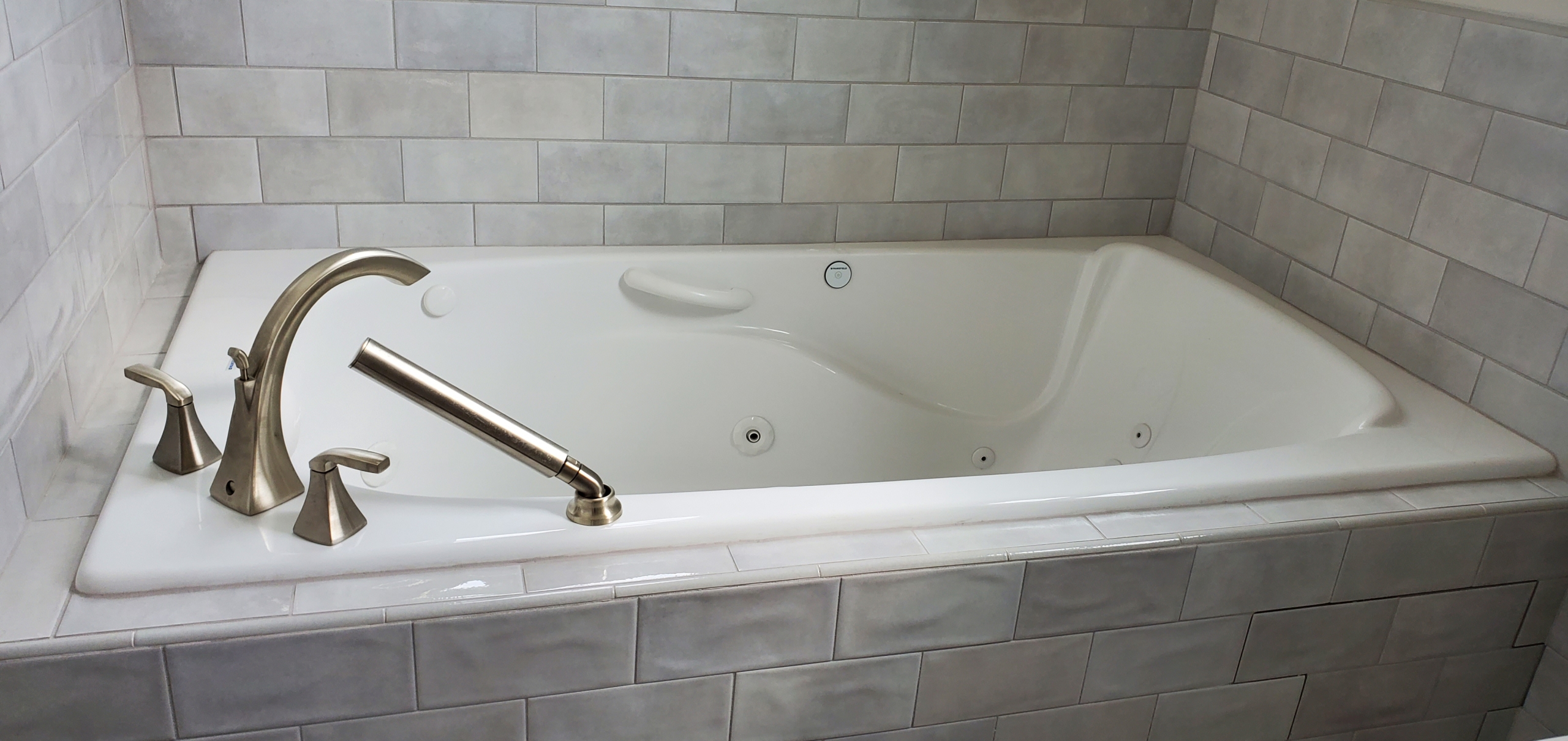 Custom home bathtub with tile surround