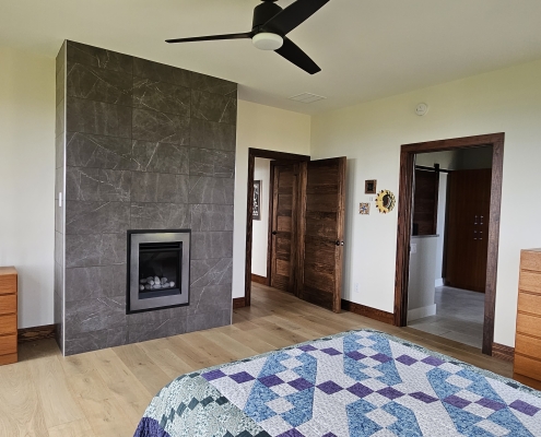 stone chimney and bedroom