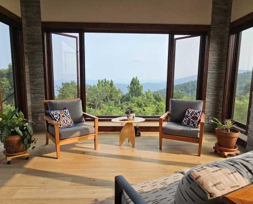 custom home sunroom with view looking off into mountains