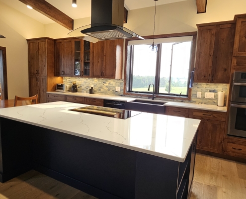 custom kitchen cabinets. Dark wood wall cabinets with blue island